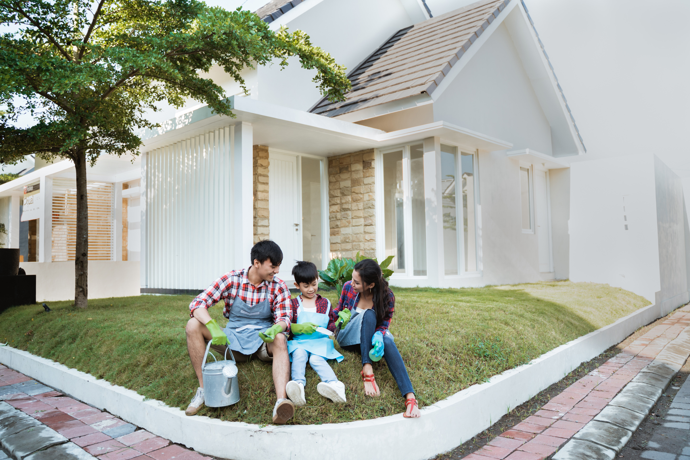 Asian People Happy Gardening with Family at Home